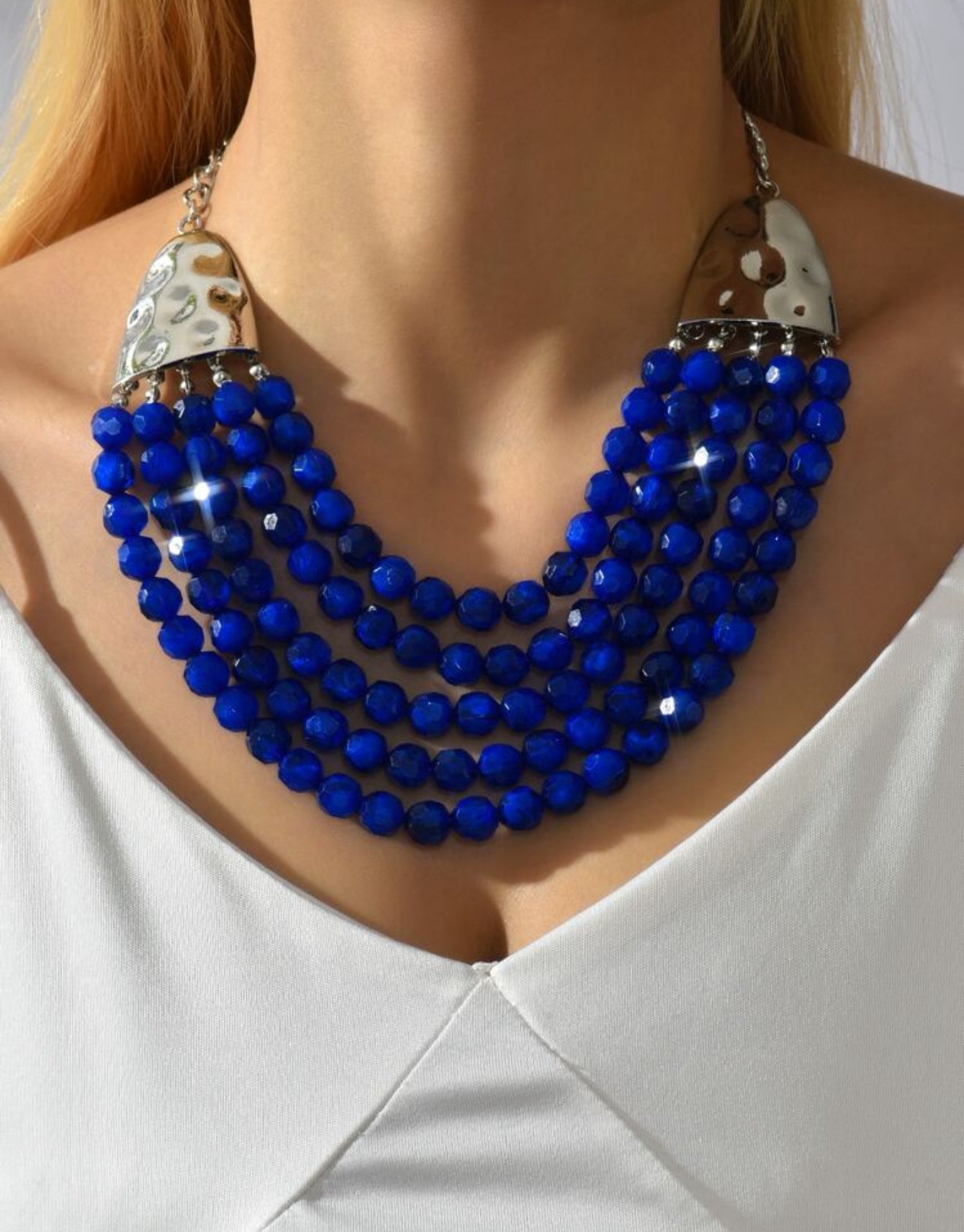 Collar cascada en piedras azul con plata