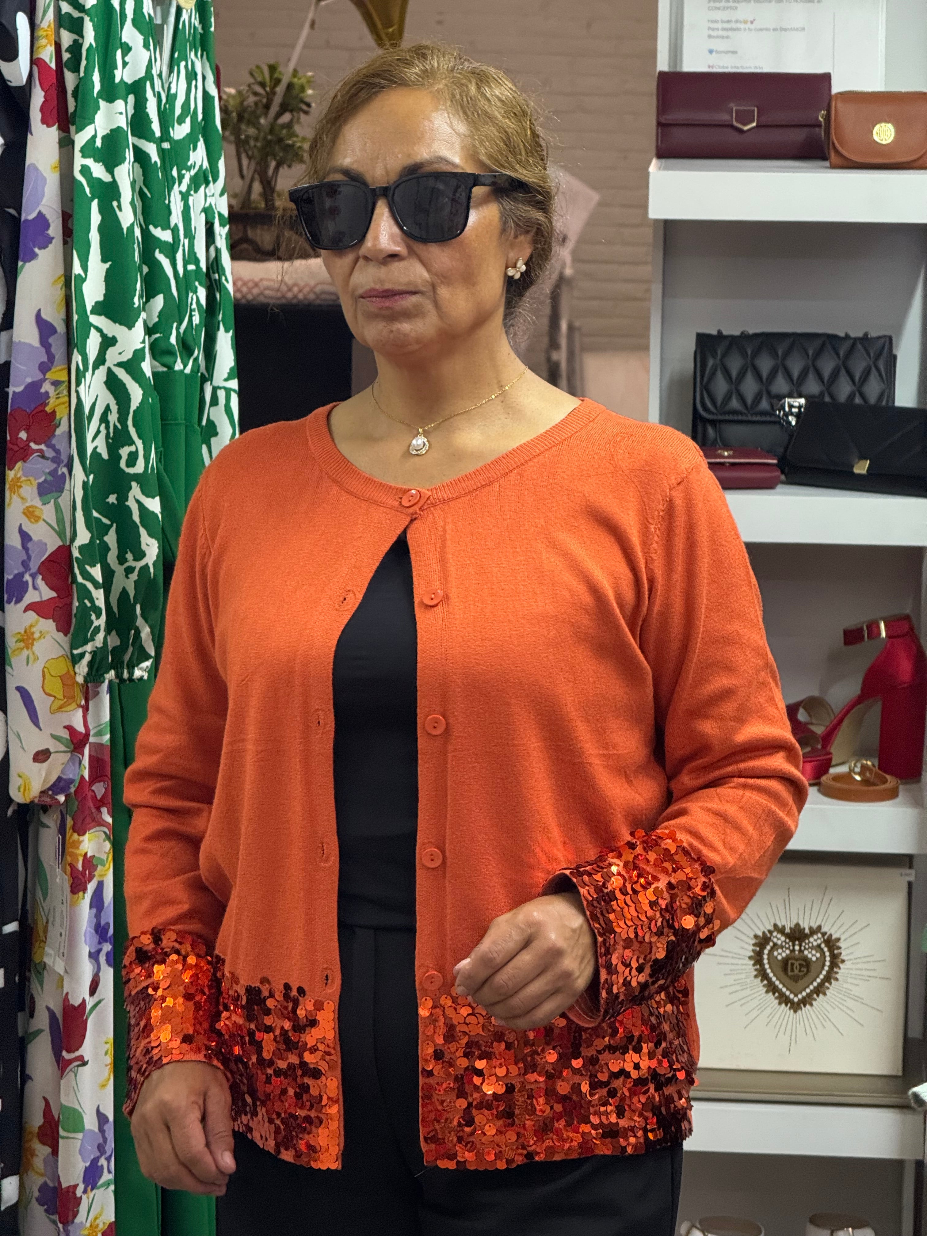 Suéter con lentejuelas