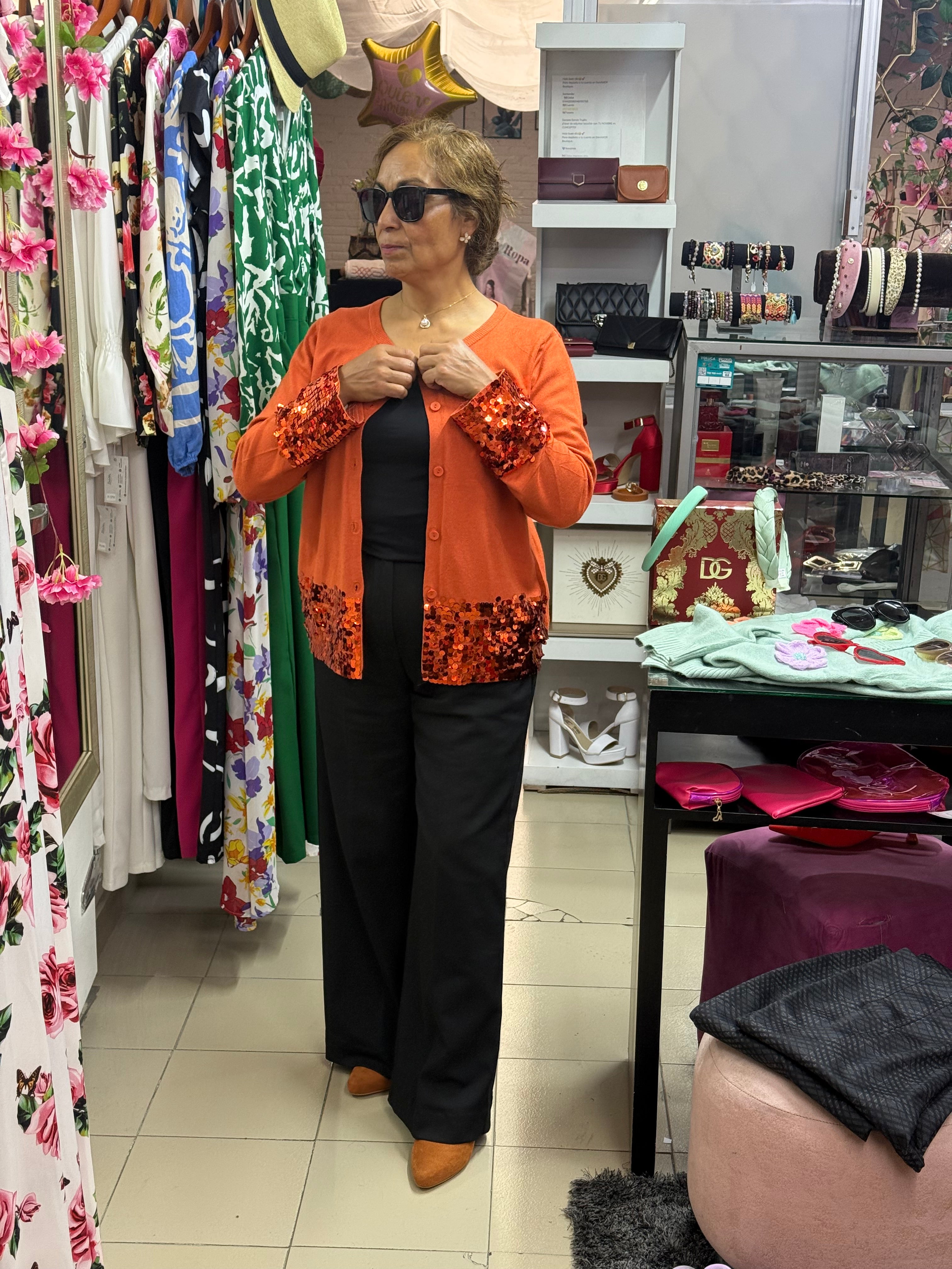 Suéter con lentejuelas