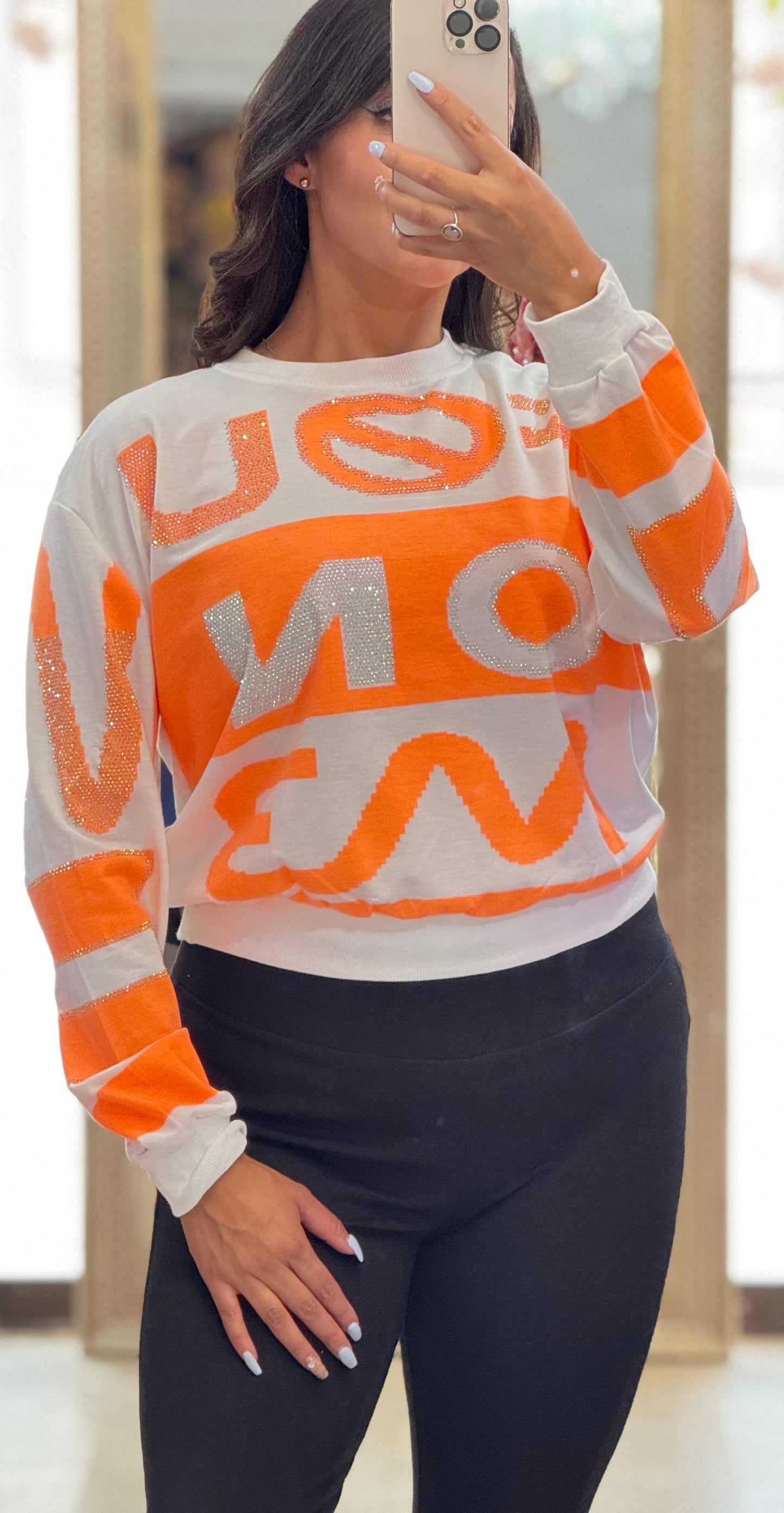 Sueter estampado neón con brillitos