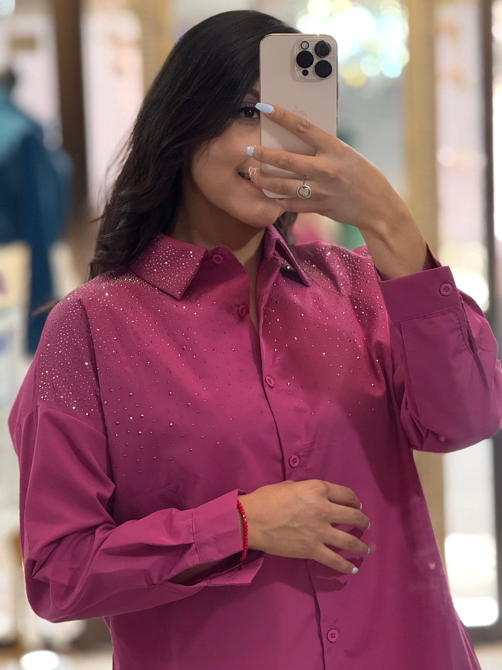 Blusa de manga larga con brillitos en pecho