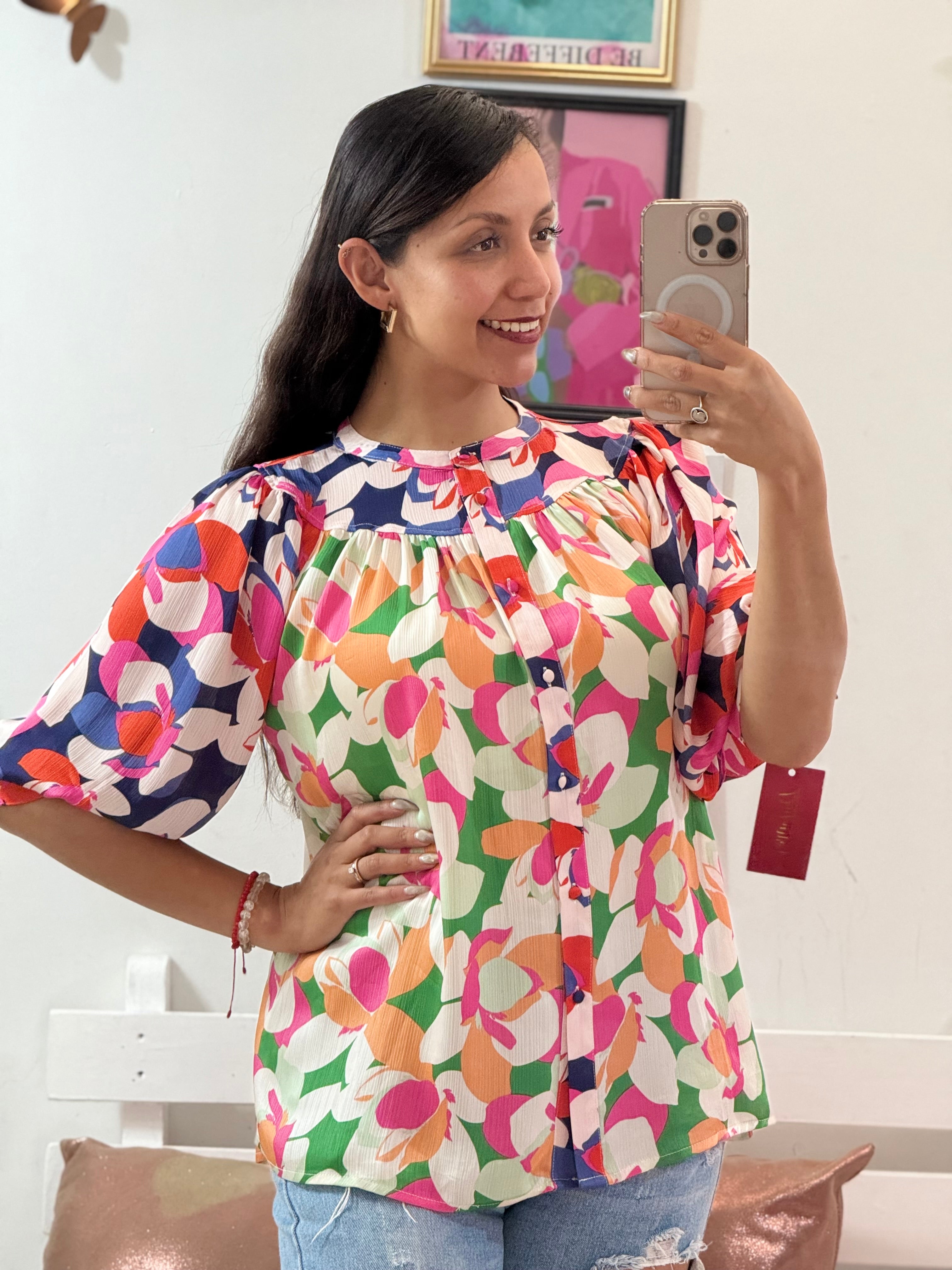 Blusa de colores manga 3/4 de cuello redondo