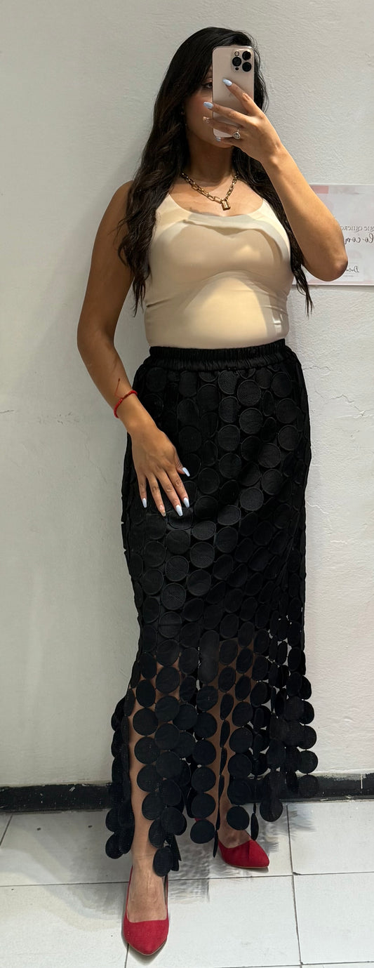 Faldita de flecos y círculos