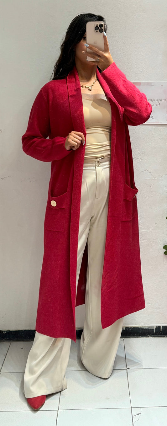 Suéter largo con bolsas y botones