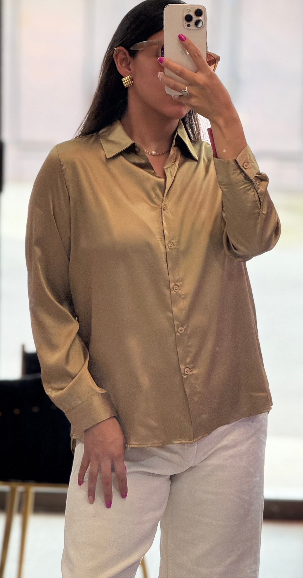 Blusa satinada elegante