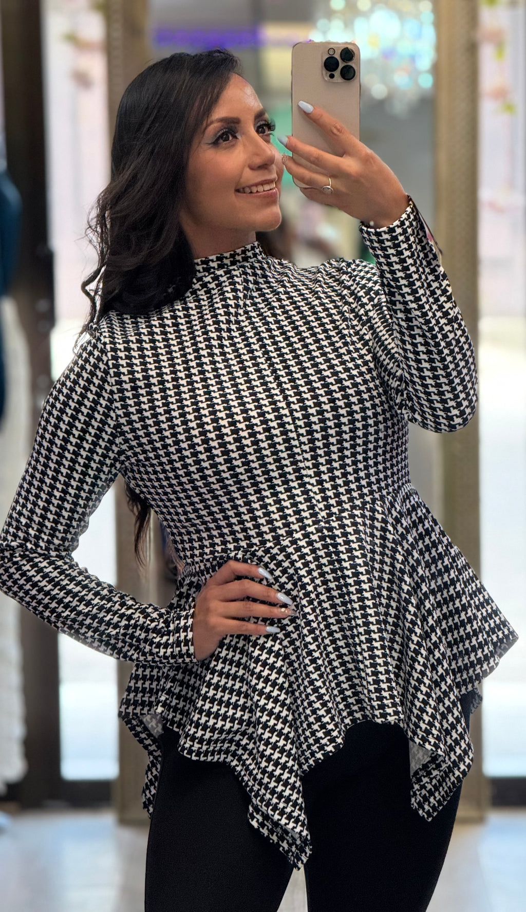 Blusa cuello alto manga larga corte peplum