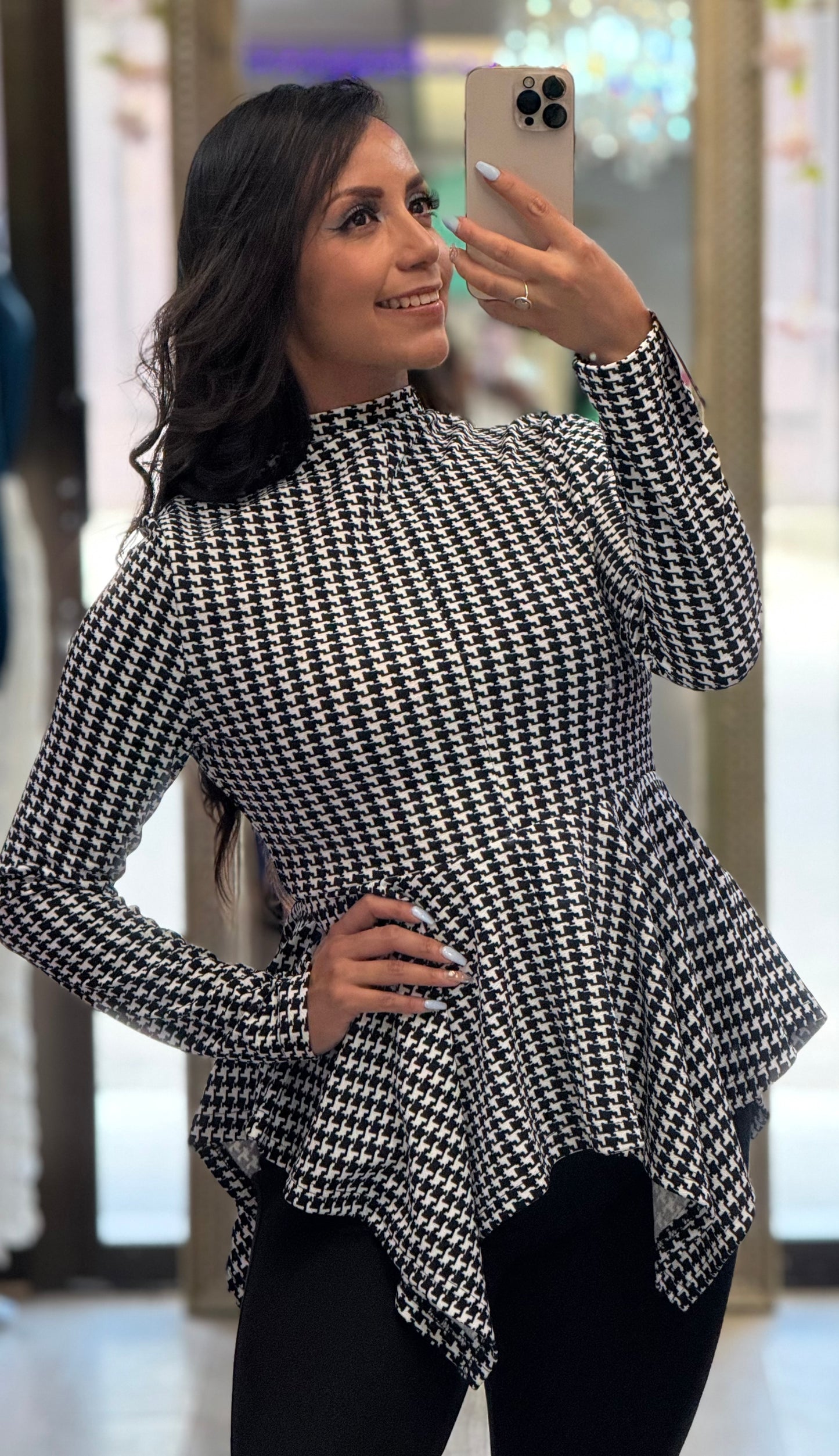 Blusa cuello alto manga larga corte peplum