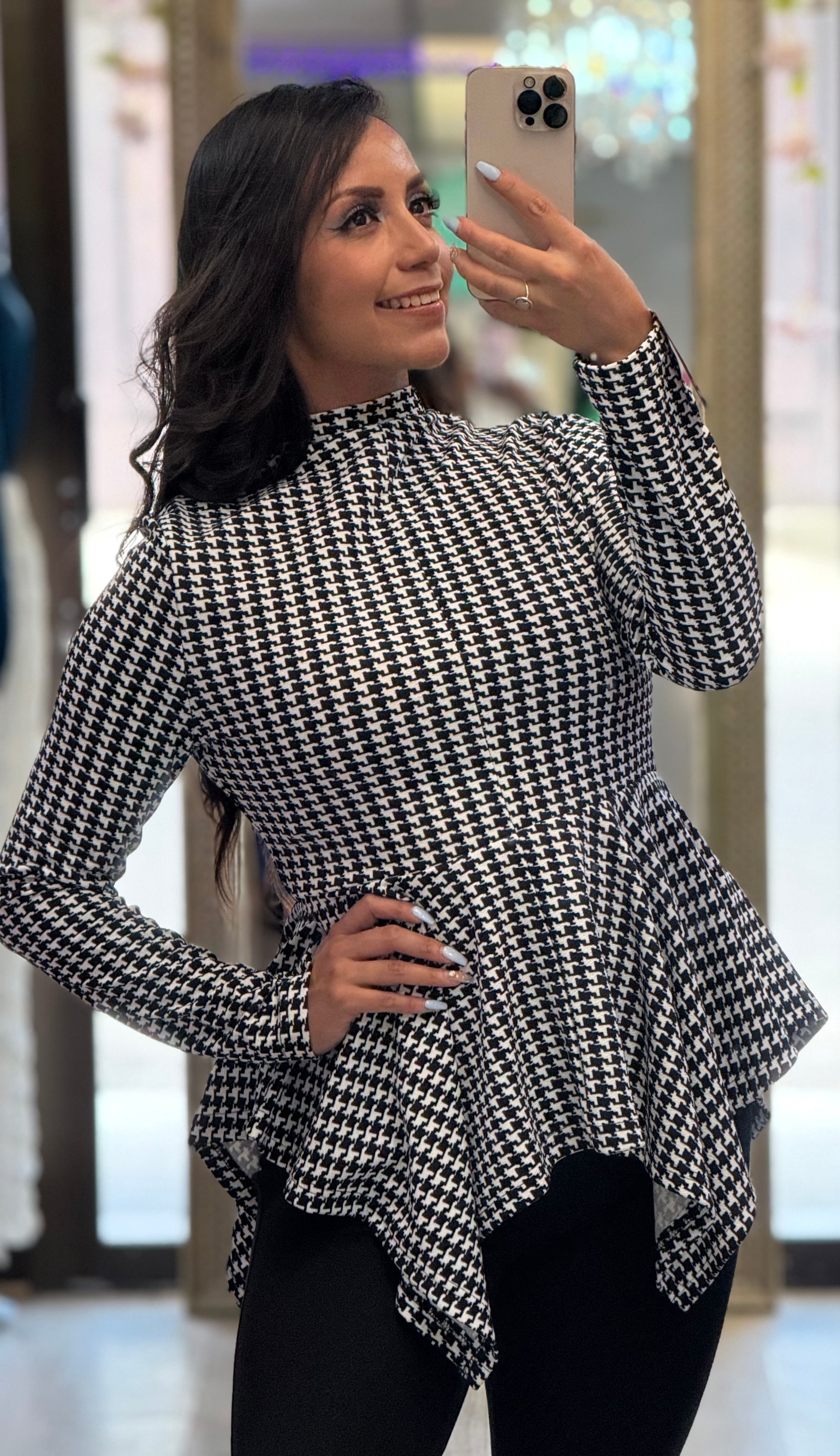 Blusa cuello alto manga larga corte peplum