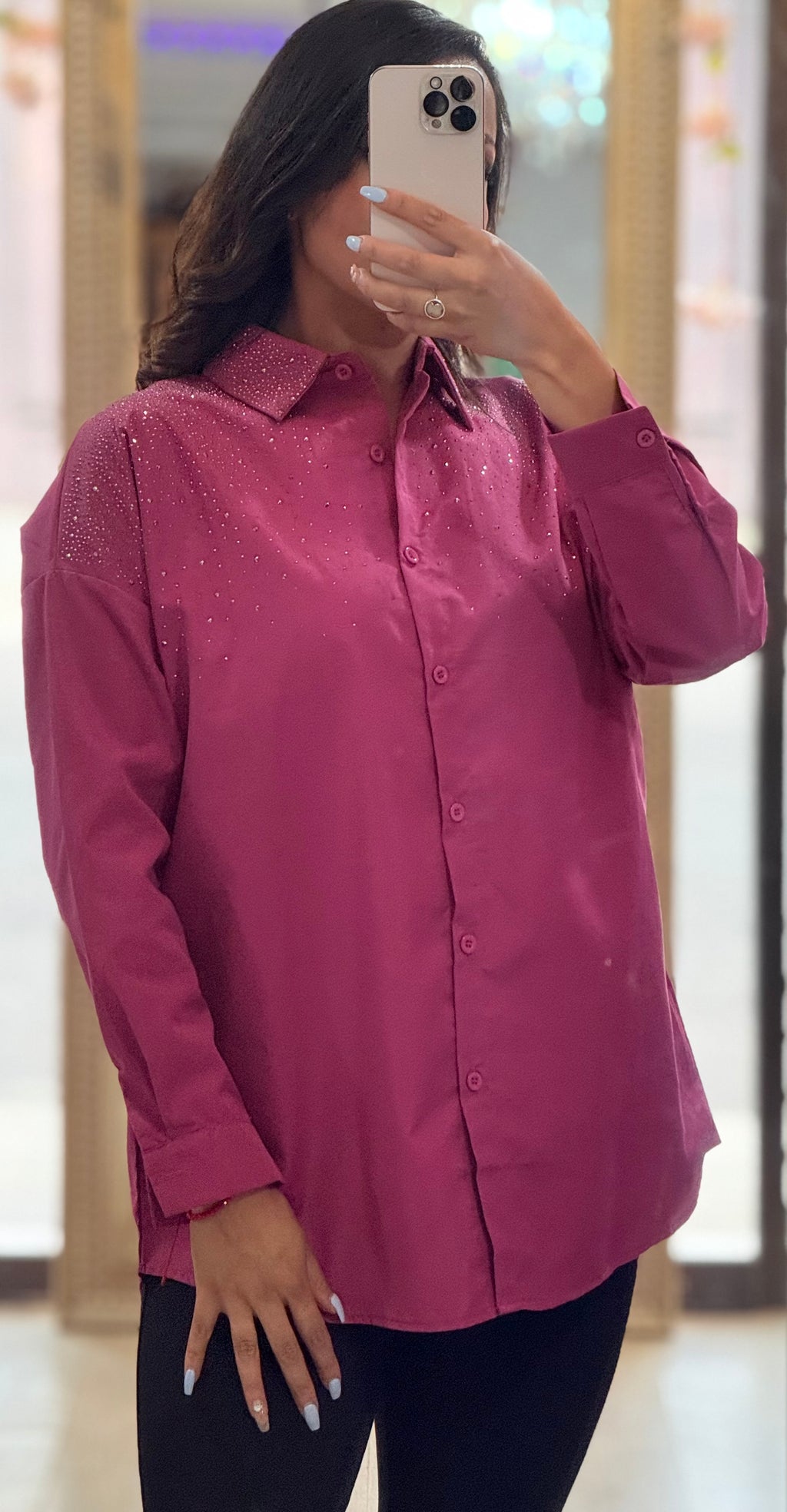 Blusa de manga larga con brillitos en pecho