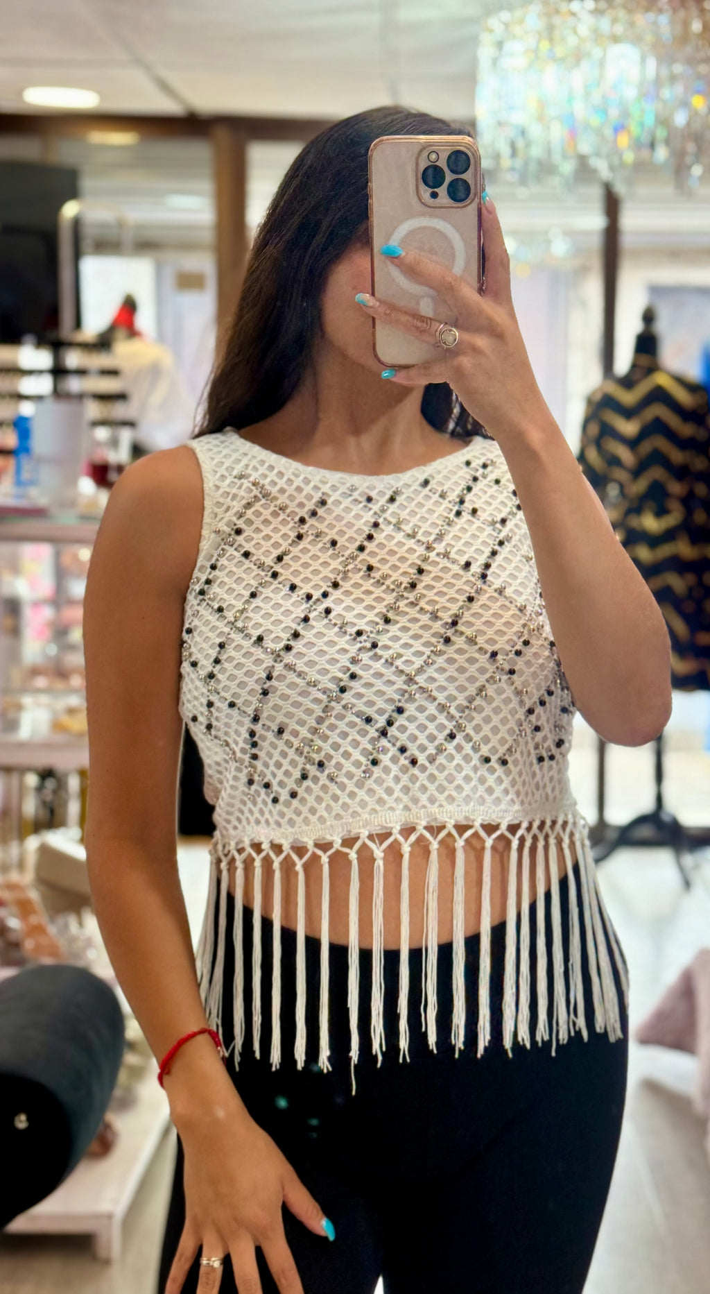 Blusa flecos