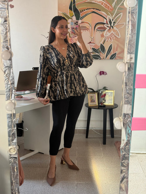 Blusa corte peplum estampada manga larga
