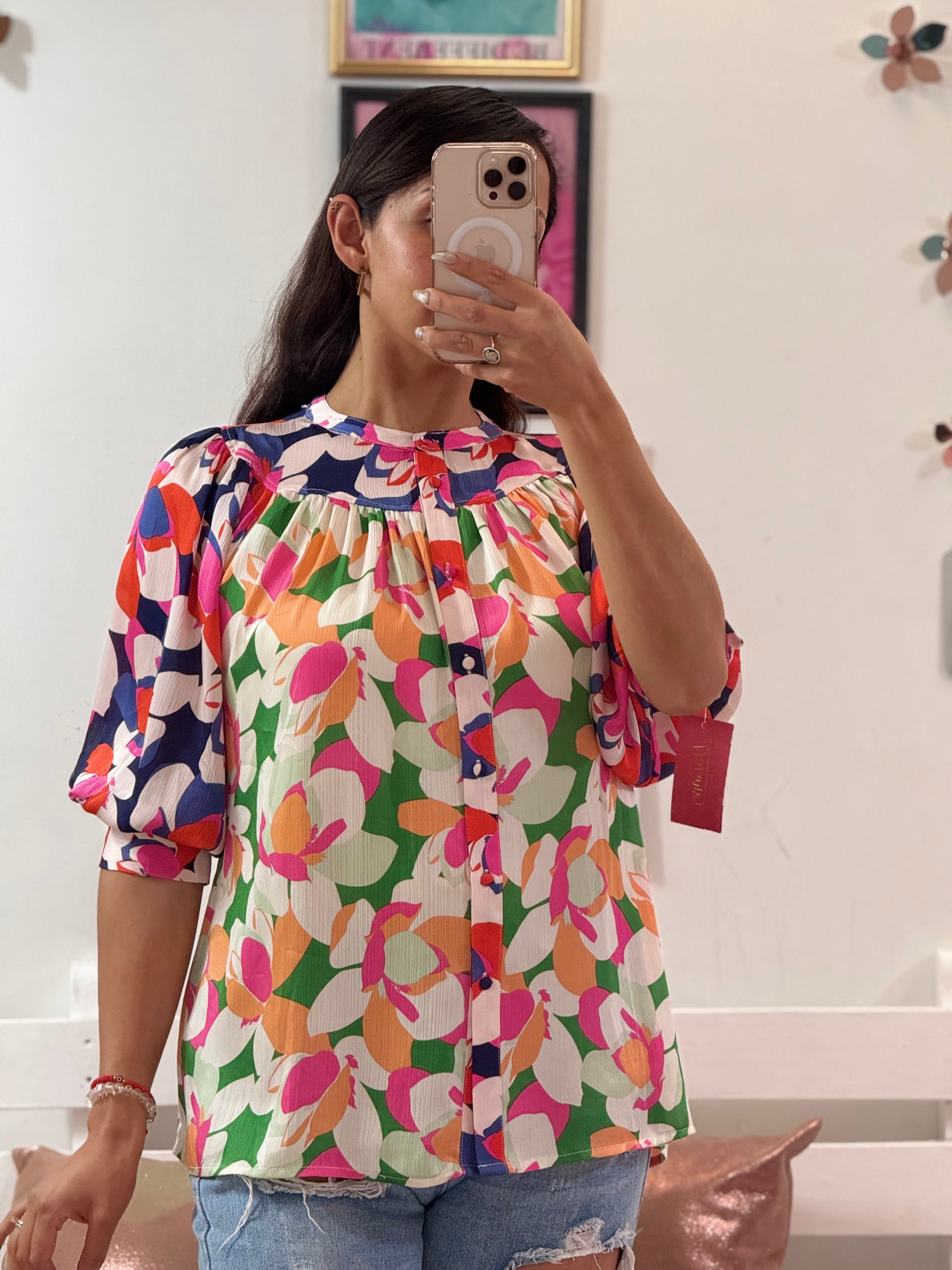 Blusa de colores manga 3/4 de cuello redondo