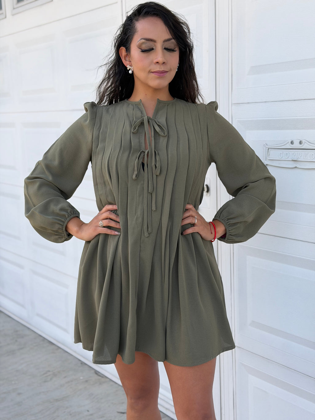 Vestido con pliegues