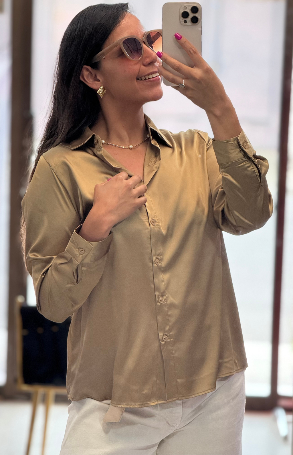Blusa satinada elegante