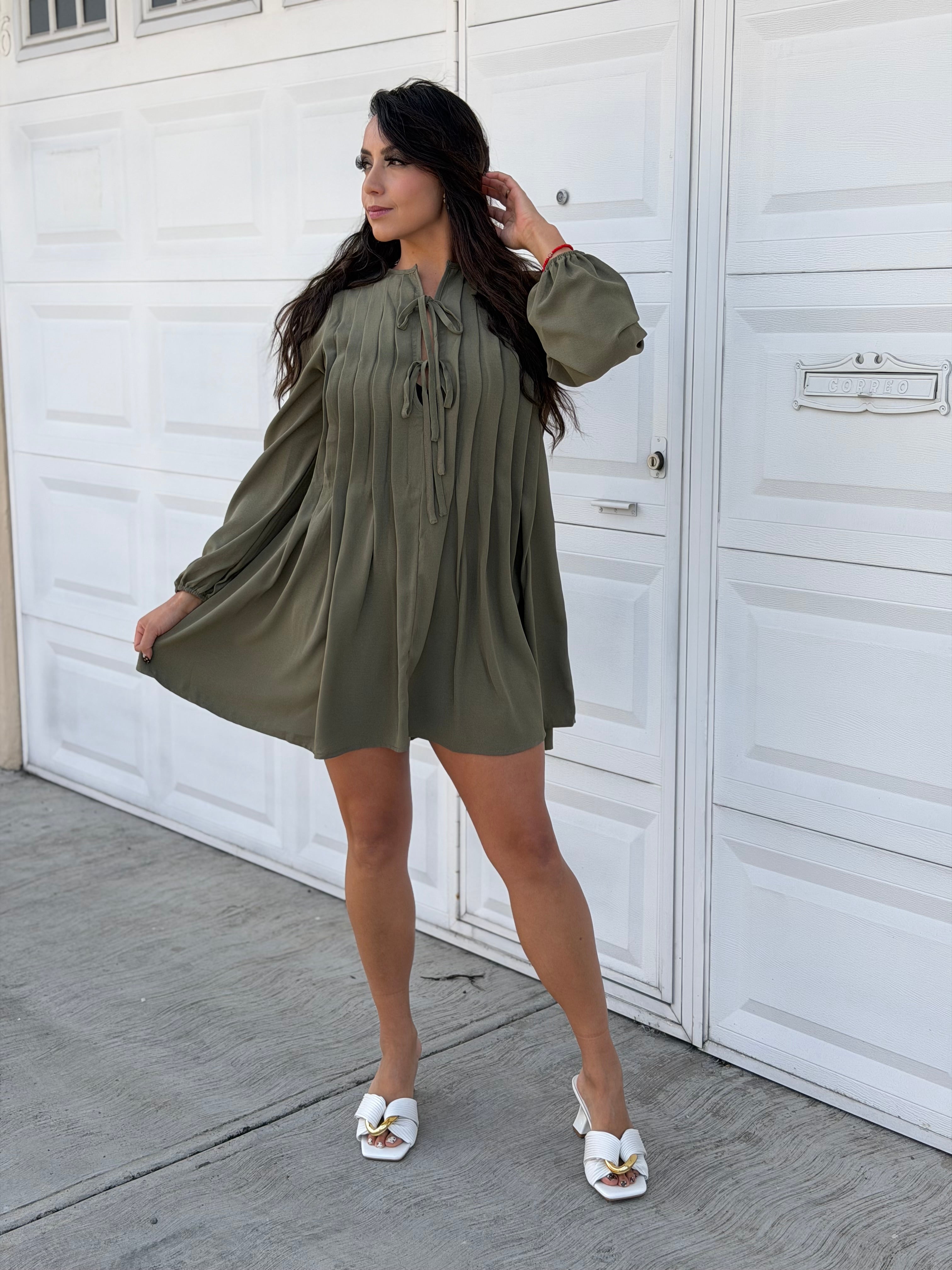 Vestido con pliegues