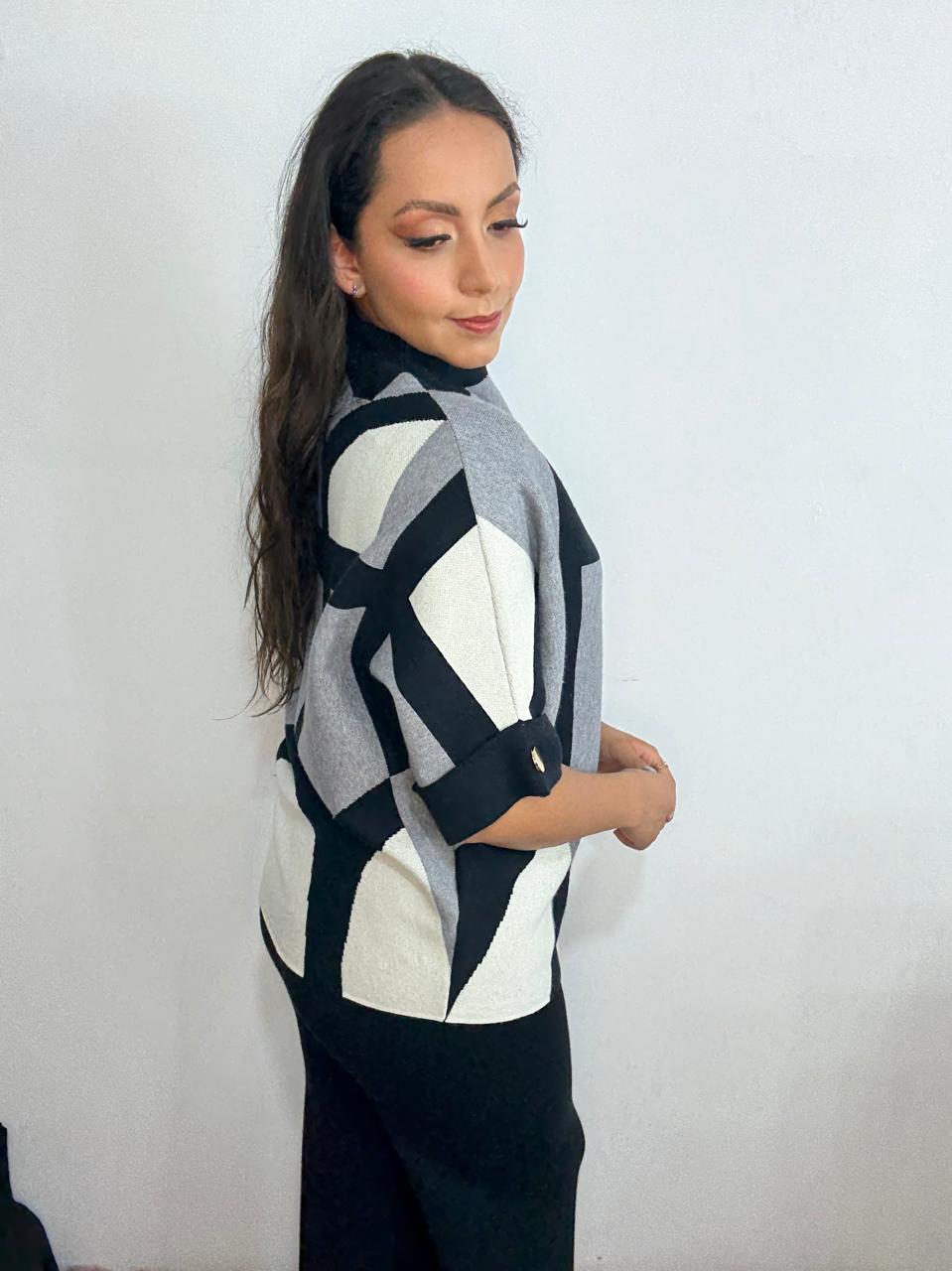 Suéter lineas asimétricas