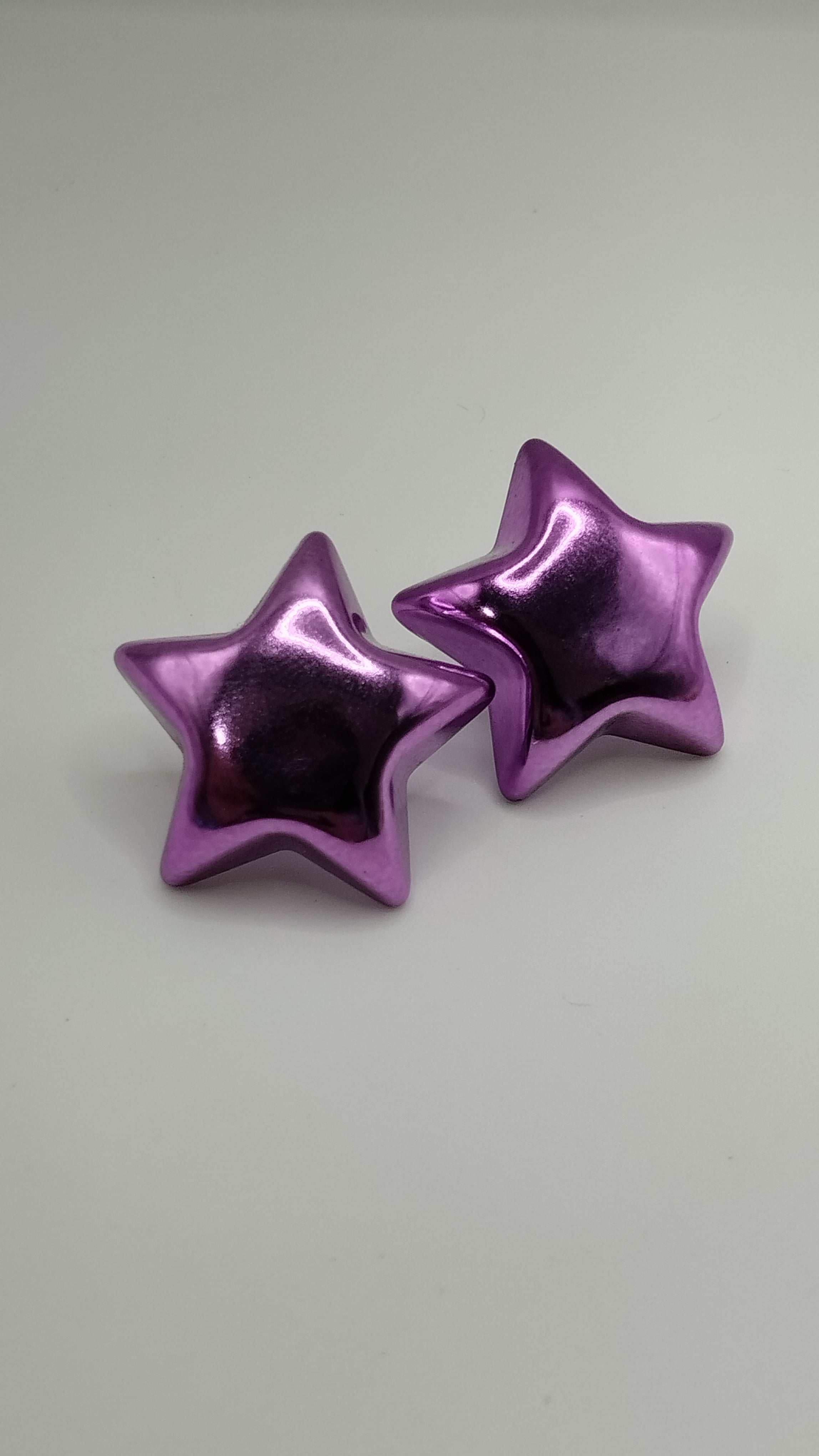 Aretes de estrella metálicos