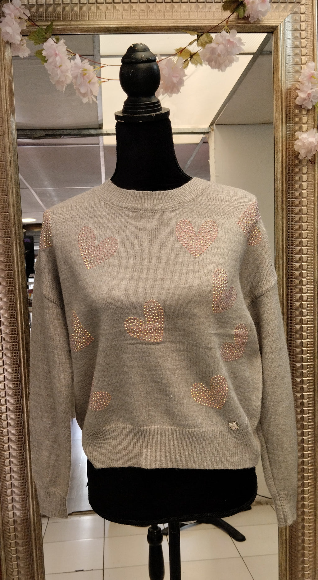 Suéter corazones con brillitos