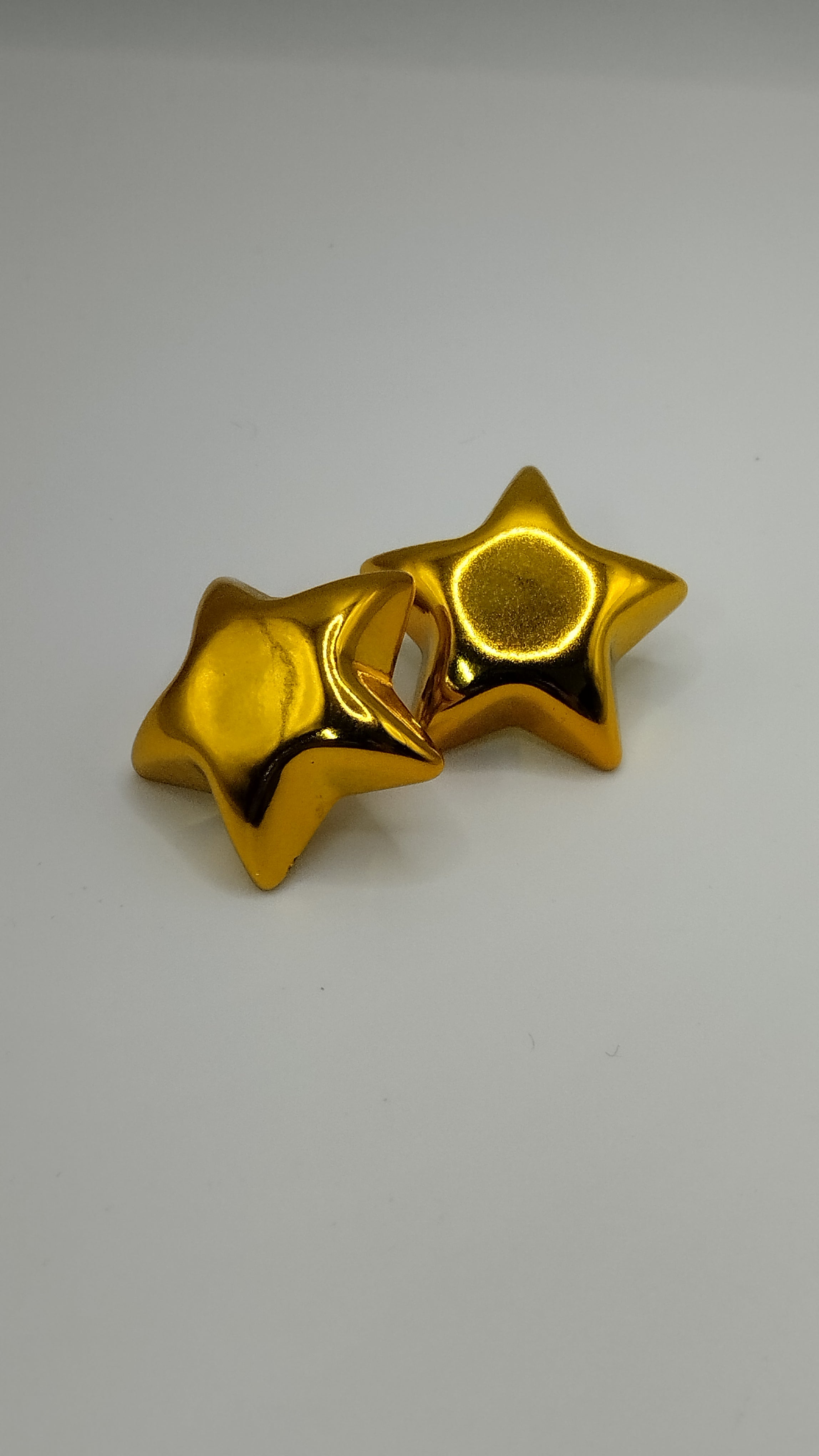 Aretes de estrella metálicos