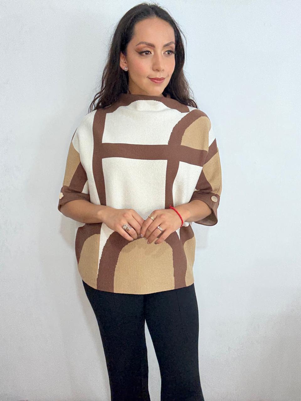 Suéter lineas asimétricas