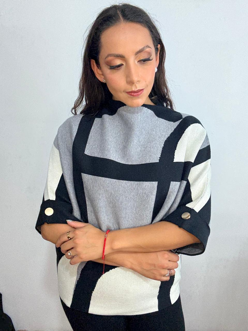 Suéter lineas asimétricas