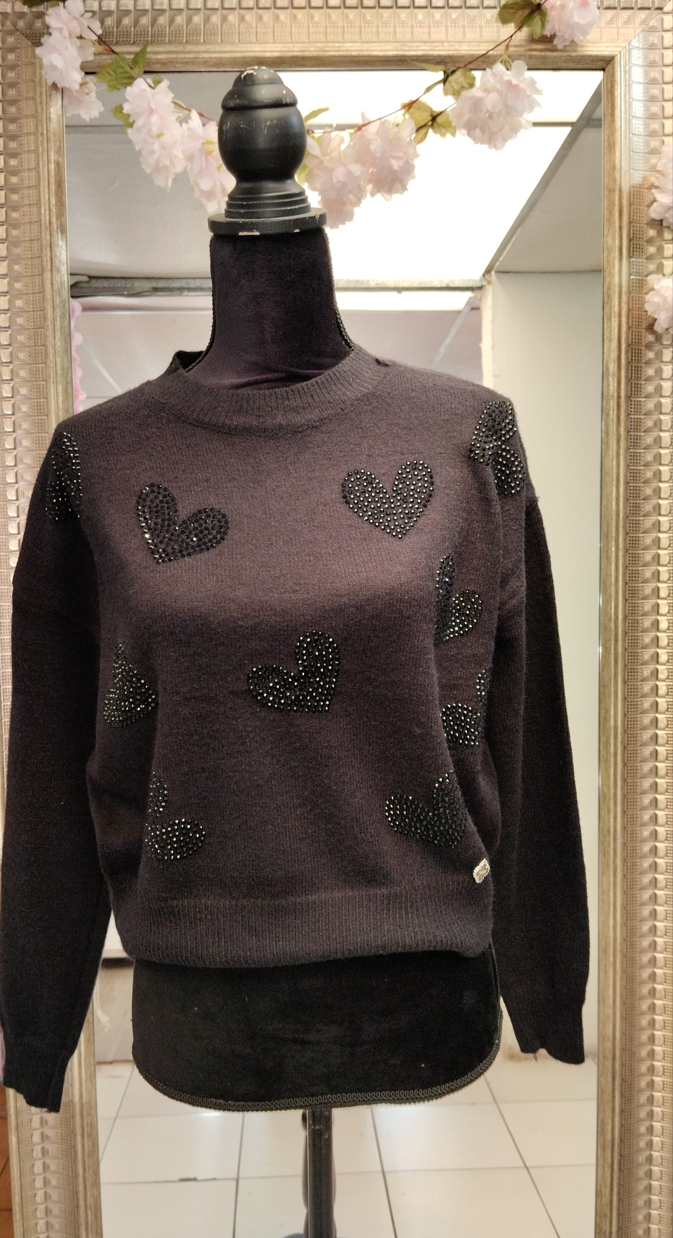 Suéter corazones con brillitos