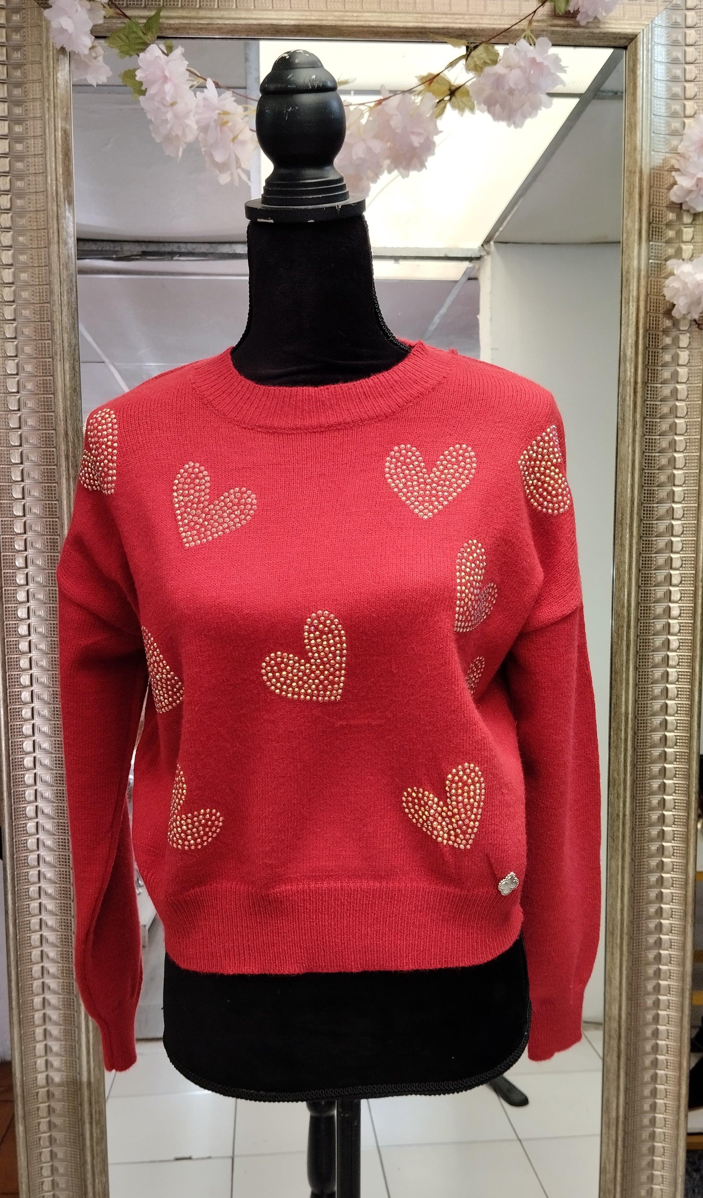 Suéter corazones con brillitos