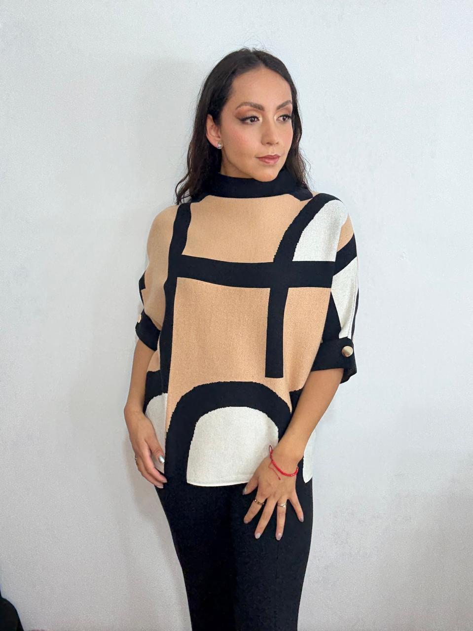 Suéter lineas asimétricas