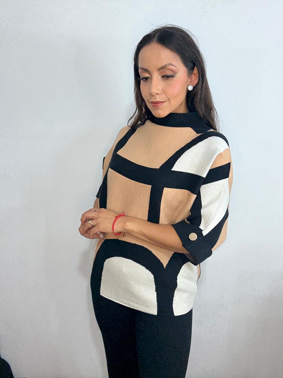 Suéter lineas asimétricas